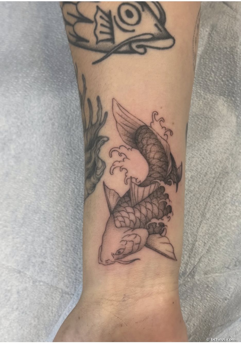 Fish — illustrative tattoo — on the forearm — by Bianca Finzi, Austin TX